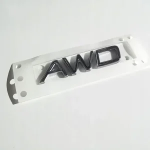 Zwrot pieniędzy VOLVO AWD emblemat na tylna klape 9157130 OE