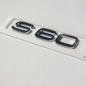 Najlepsza cena VOLVO S60 emblemat na tylna klape 31301197 OE