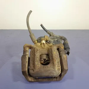 BMW X3 F25 ZACISK HAMULCOWY JARZMO TYŁ LEWY ELEKTRYCZNY 44/20 Kup teraz